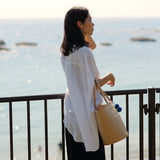 'Nanci' パームヤシ使用 ポンポン付き バッグ - ペルー人アーティストハンドメイド