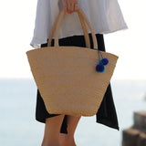 'Nanci' パームヤシ使用 ポンポン付き バッグ - ペルー人アーティストハンドメイド